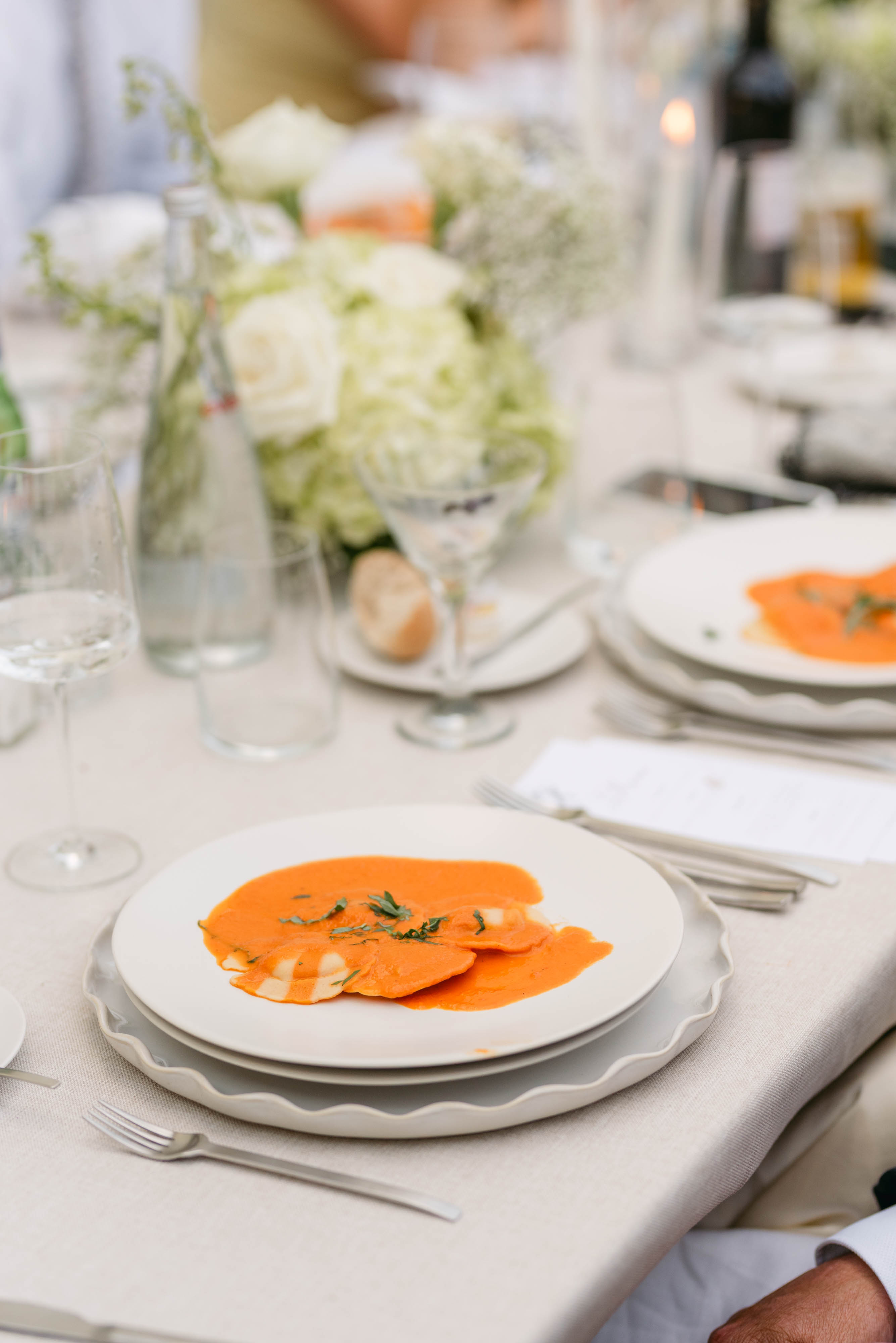 Farm-to-table plated course of pumpkin ravioli by La Dolce Sera at a Sorella 1881 wedding